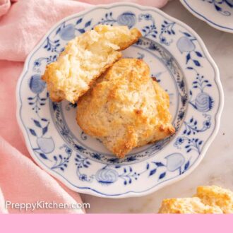 Pinterest graphic of a plate with a drop biscuit with a second half propped on top.