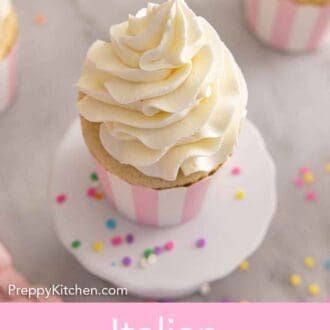 Pinterest graphic of a cupcake with Italian buttercream piped on top.
