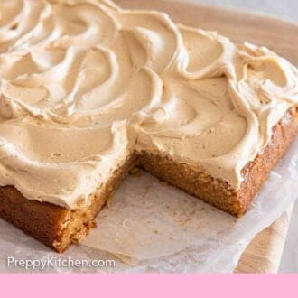 Pinterest graphic of a peanut butter cake with a slice cut out.