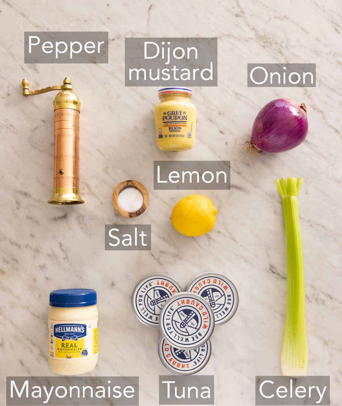 Ingredients needed to make tuna salad.