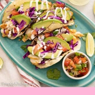 Pinterest graphic of an overhead view of a platter of fish tacos.