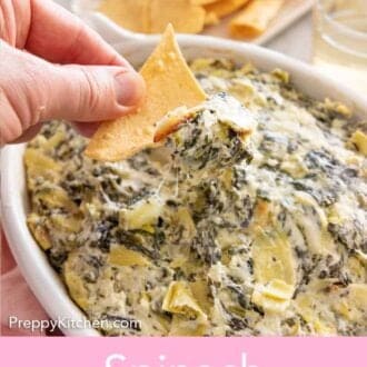 Pinterest graphic of a chip scooping up spinach artichoke dip from a baking dish.