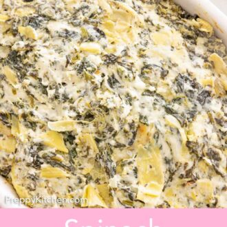 Pinterest graphic of a close up view of a dish of spinach artichoke dip.