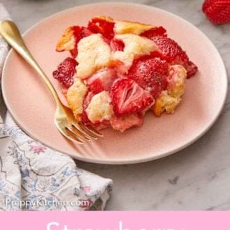 Pinterest graphic of a serving of strawberry cobbler on a plate with a fork.