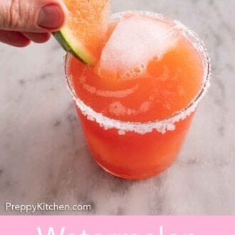 Pinterest graphic of a slice of fresh watermelon added to a glass of watermelon margarita.