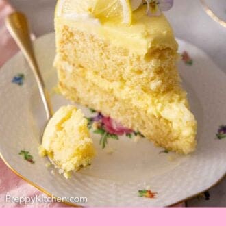 Pinterest graphic of a slice of lemon cake with the tip of the cake on the fork resting beside it.