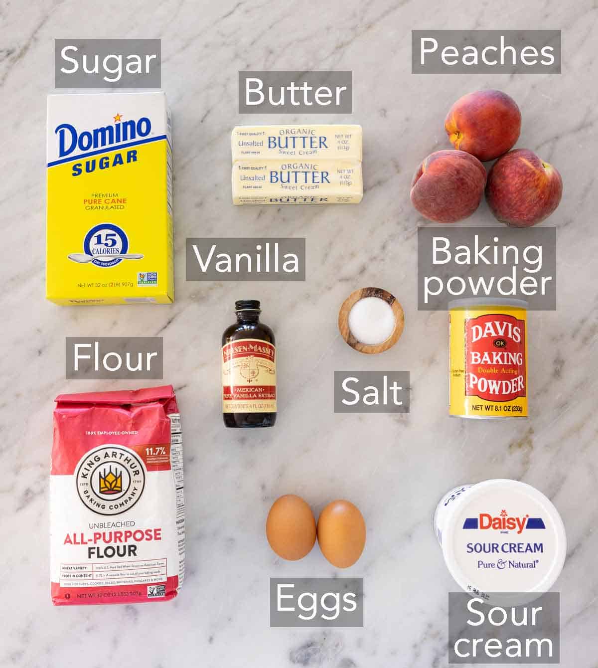 Ingredients needed to make a peach cake.