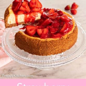 Pinterest graphic of a slice of strawberry cheesecake lifted from the cake on a clear cake stand.