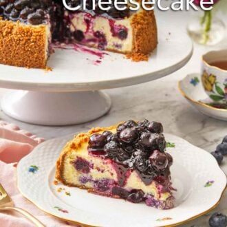 Pinterest graphic a slice of blueberry cheesecake on a plate in front of a cake stand with the rest of the cake.