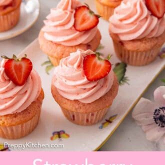 Pinterest graphic of an oval platter of four strawberry cupcakes.