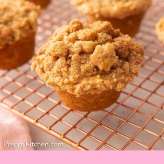 Pinterest graphic of multiple apple muffins cooling on a wire rack.