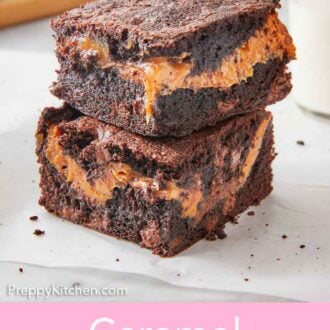 Pinterest graphic of two caramel brownies stacked on top of each other with a glass of milk in the background.