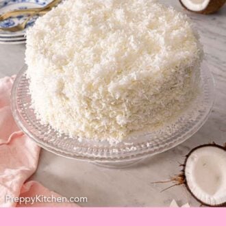 Pinterest graphic of a coconut cake on a cake stand with some fresh coconuts scattered around.