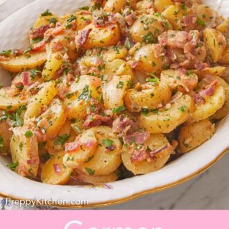 Pinterest graphic of a close view of a platter of German potato salad with crispy bacon and parsley over the potatoes.