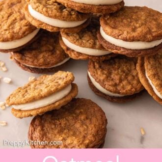 Pinterest graphic of a pile of oatmeal cream pies with some oats scattered around.