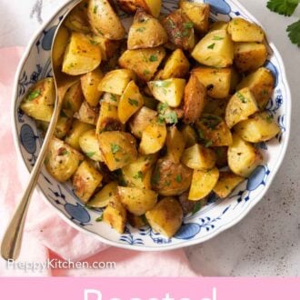Pinterest graphic of an overhead view of a bowl of roasted potatoes with a spoon tucked in.