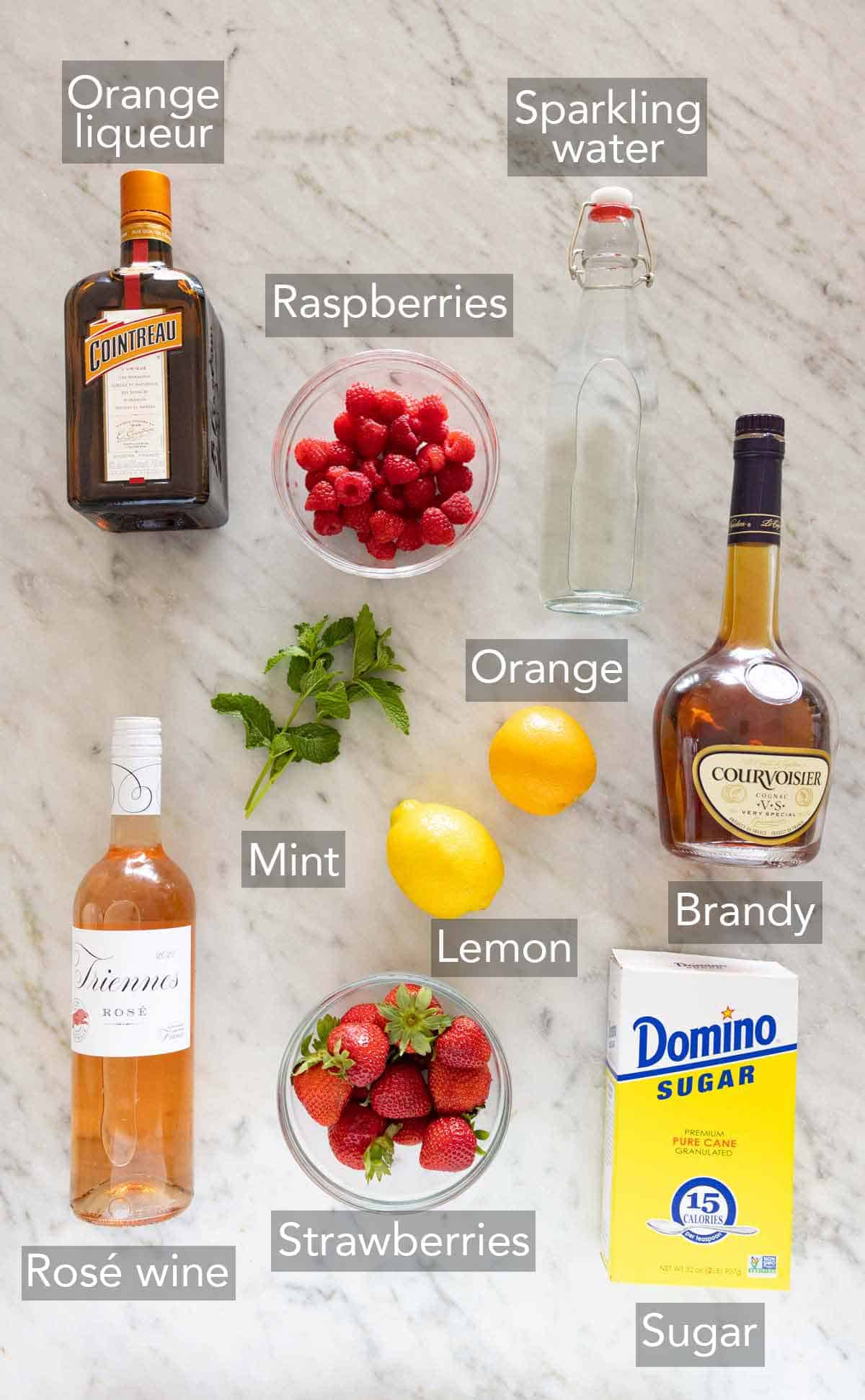 Ingredients needed to make rose sangria.