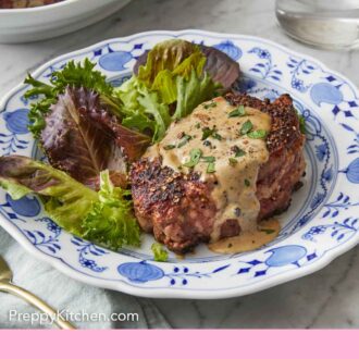 Pinterest graphic of a plate with a serving of steak au poivre and salad on the side.