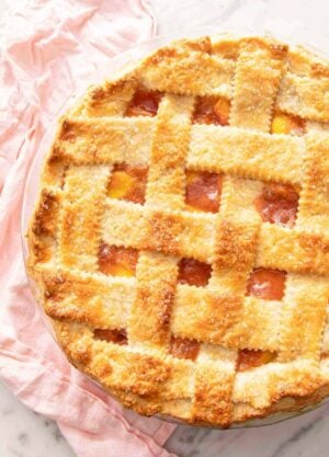 Overhead view of a baked pie with lattice crust.