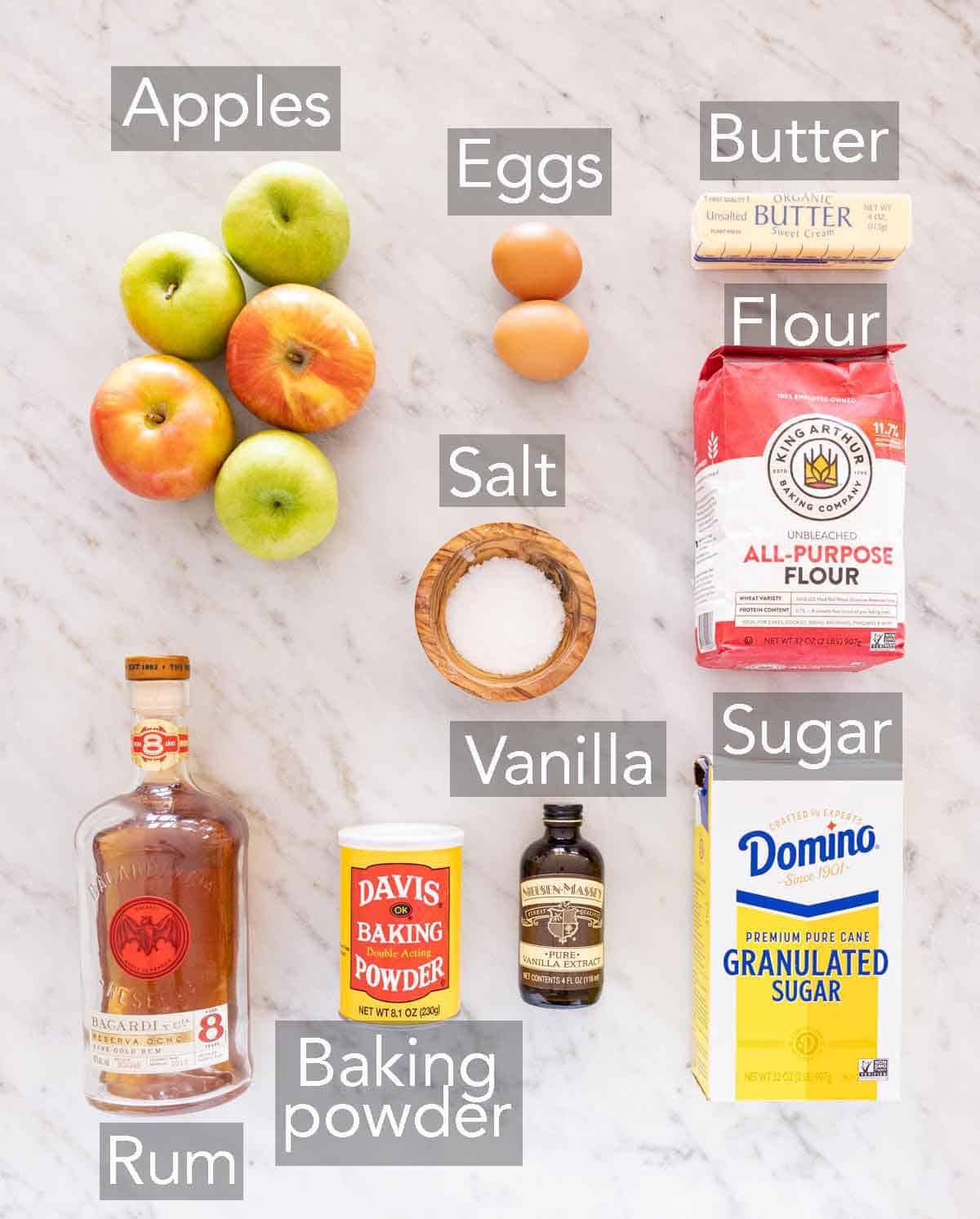 Ingredients needed to make a French apple cake.