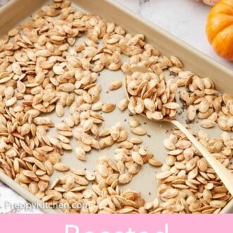 Pinterest graphic of a sheet pan of roasted pumpkin seeds with a spoonful inside.