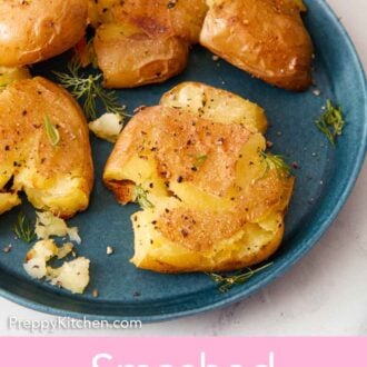 Pinterest graphic of a blue plate with a couple of smashed potatoes with fresh dill.