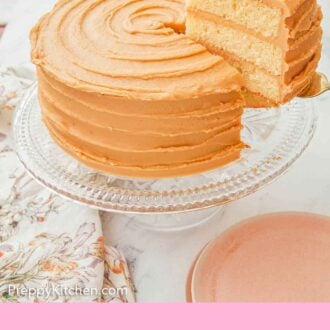 Pinterest graphic of a slice of caramel cake being lifted from the rest of the cake.