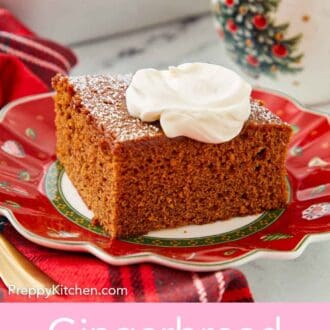 Pinterest graphic of a profile view of a slice of gingerbread cake with a dollop of whipped cream on top.