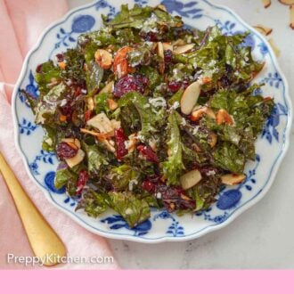 Pinterest graphic of an overhead view of a serving plate of kale salad with some almonds scattered beside it.