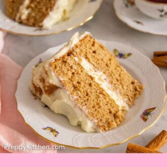 Pinterest graphic of a slice of spice cake on a plate with another slice in the background with tea.