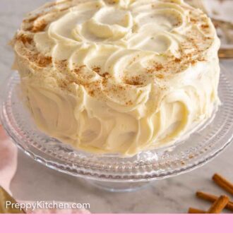 Pinterest graphic of a frosted spice cake on a clear cake stand.