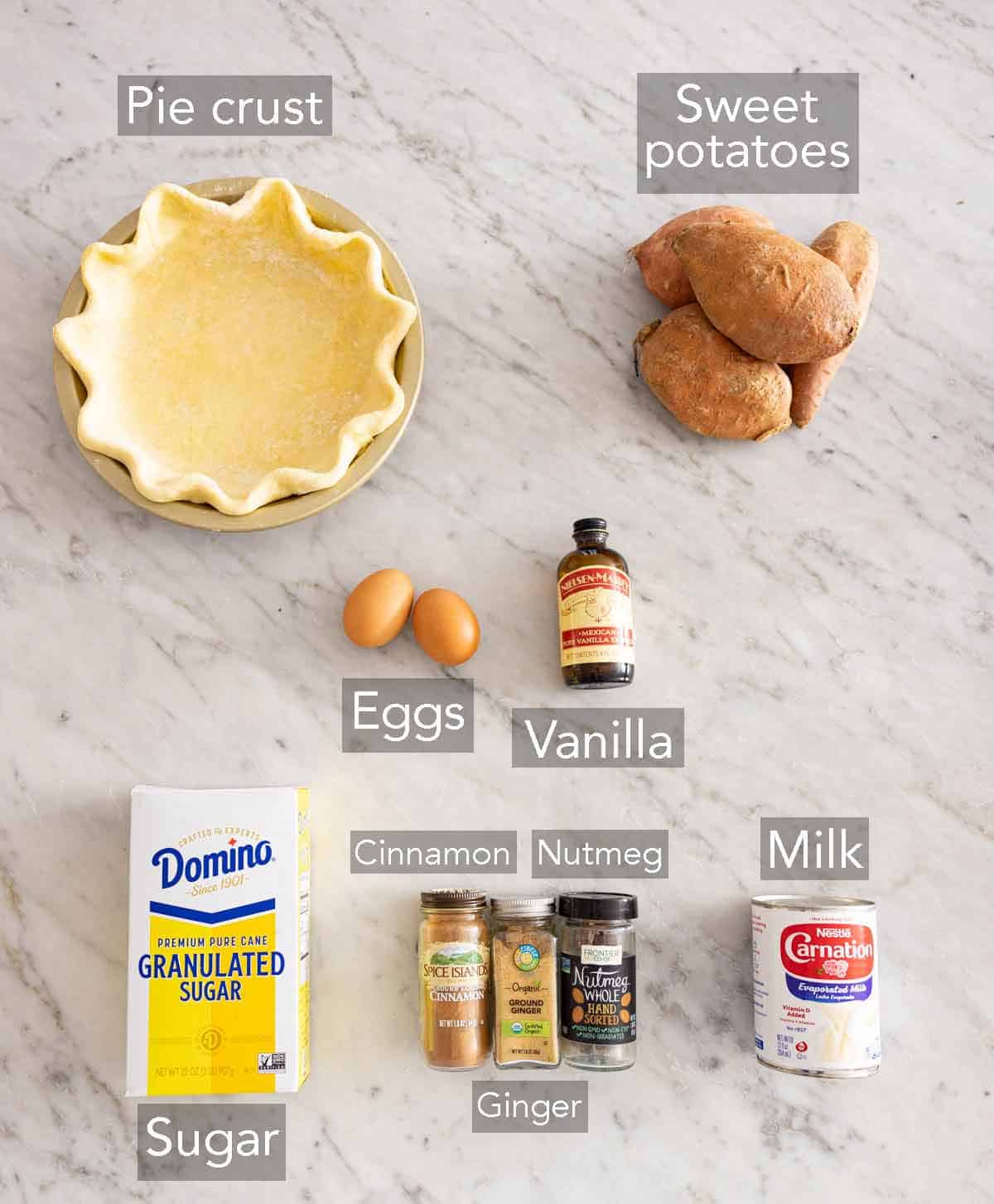 Ingredients needed to make a sweet potato pie.
