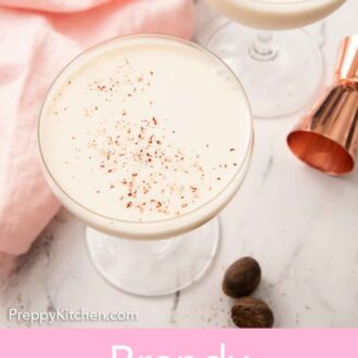 Pinterest graphic of an overhead view of a glass of Brandy Alexander with freshly shaved nutmeg on top.