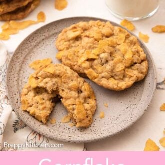 Pinterest graphic of a plate of multiple cornflake cookies with one torn in half.