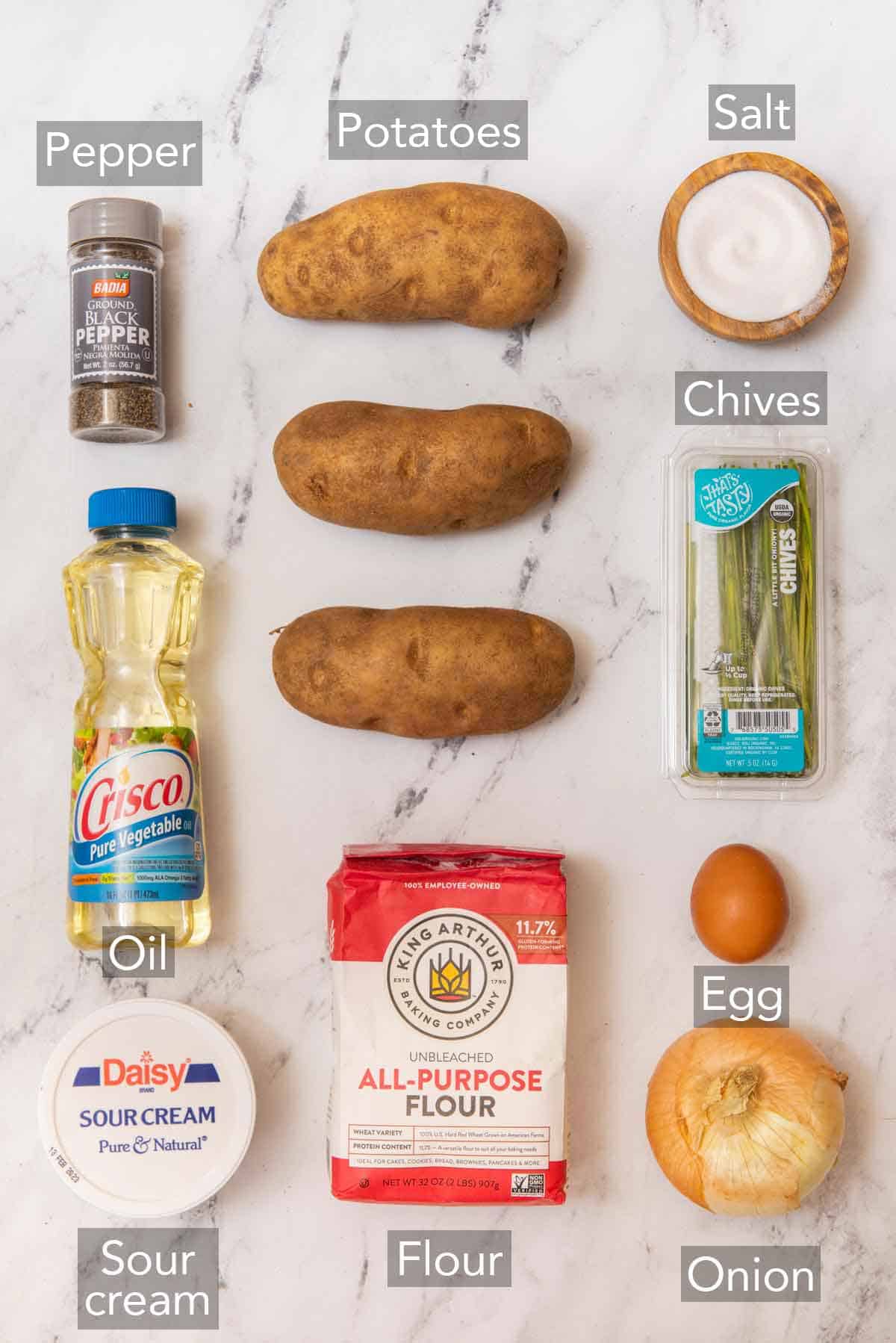 Ingredients needed to make potato pancakes.