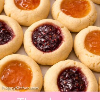 Pinterest graphic of a close view of multiple thumbprint cookies in a single layer.
