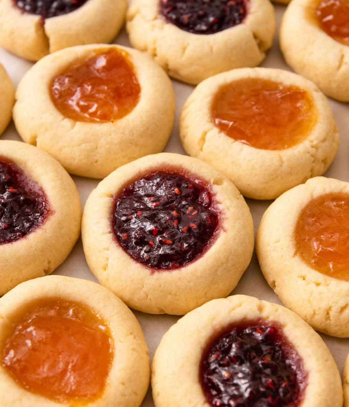 Multiple thumbprint cookies in a single layer with two different types of jam.