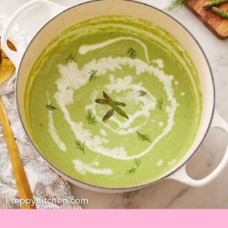 Pinterest graphic of a pot of asparagus soup with fresh dill and asparagus garnish with a drizzle of cream.
