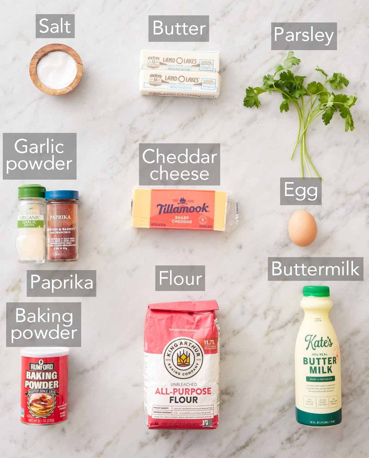Ingredients needed to make cheddar biscuits.