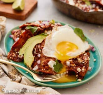 Pinterest graphic of a plate of chilaquiles with a fried egg on top.