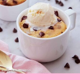 Pinterest graphic of two cookie in a mug, one in the front and in focus, with scoops of ice cream on top.