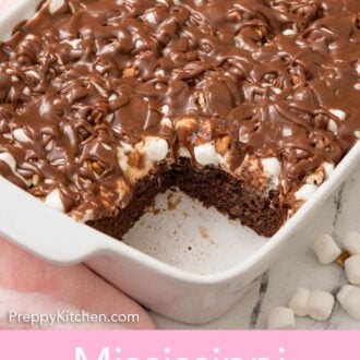 Pinterest graphic of a white baking dish containing a Mississippi mud cake with a slice cut out.