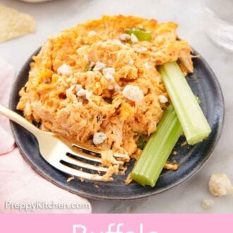 Pinterest graphic of a plate of buffalo chicken dip with a fork and two celery sticks.