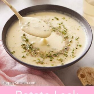 Pinterest graphic of a bowl of potato leek soup with a spoonful scooped up.