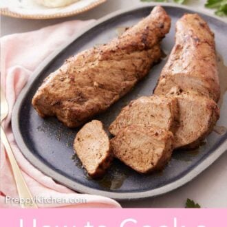 Pinterest graphic of a platter with two logs of pork tenderloin with one sliced.