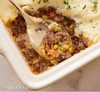 Pinterest graphic of a spoon scooping out shepherd's pie in a baking dish.