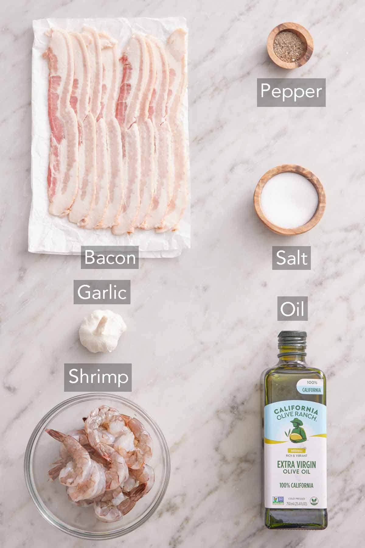 Ingredients needed to make bacon wrapped shrimp.