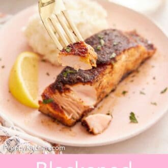 Pinterest graphic of a forkful of blackened salmon lifted from a plate of salmon.