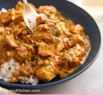 Pinterest graphic of a forkful of chicken curry lifted from a bowl.