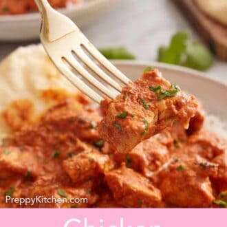 Pinterest graphic of a forkful of chicken tikka masala lifted.